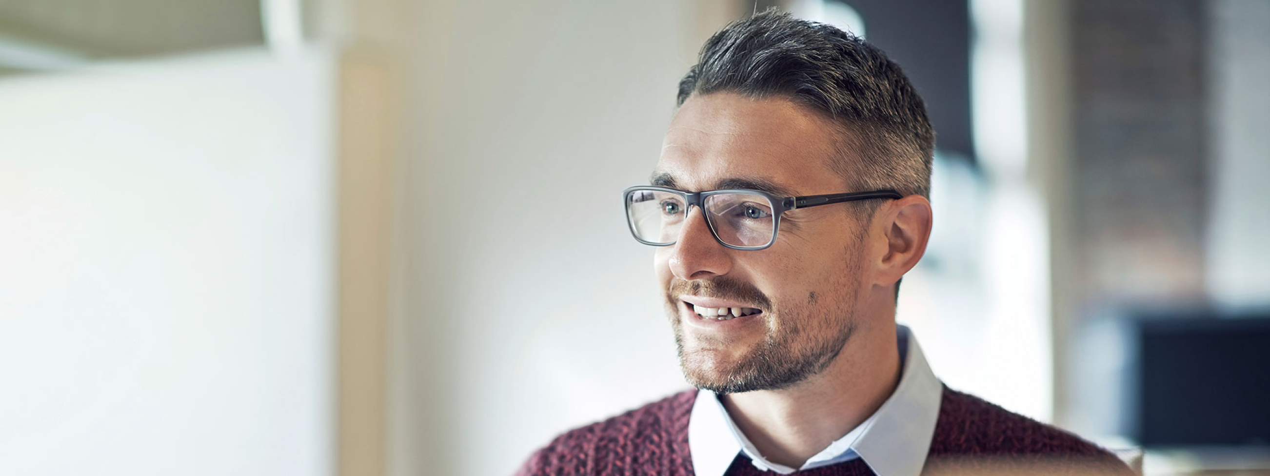 Smiling man with glasses 