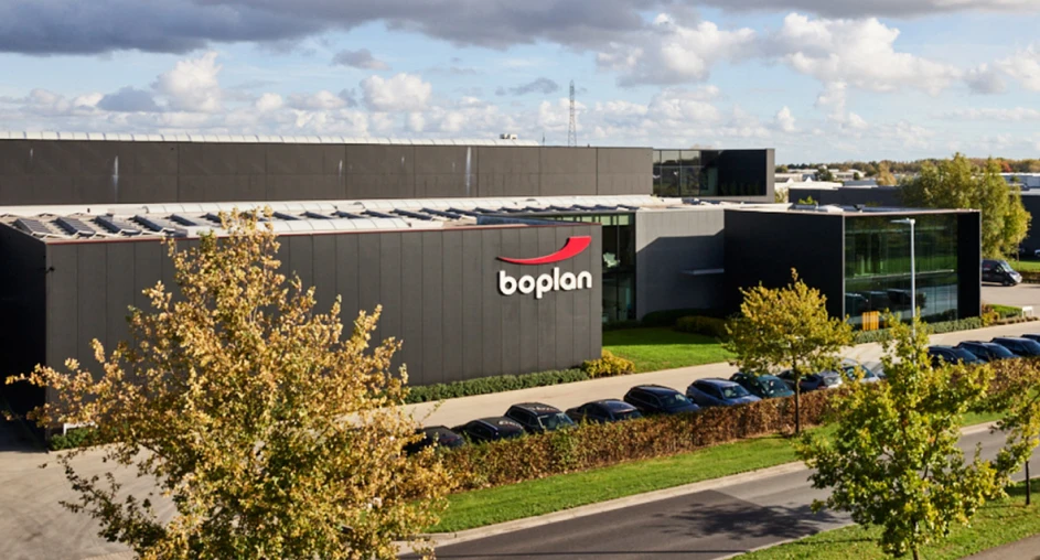 Picture of grey building with BoPlan logo surrounded by trees